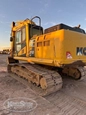 Front of used Excavator,Used Excavator,Side of used Komatsu Excavator,Back of used Excavator,Used Komatsu Excavator,Side of used Excavator under setting sun